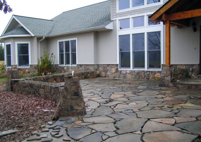 Slate Patio Entry with Stone Walled Courtyard